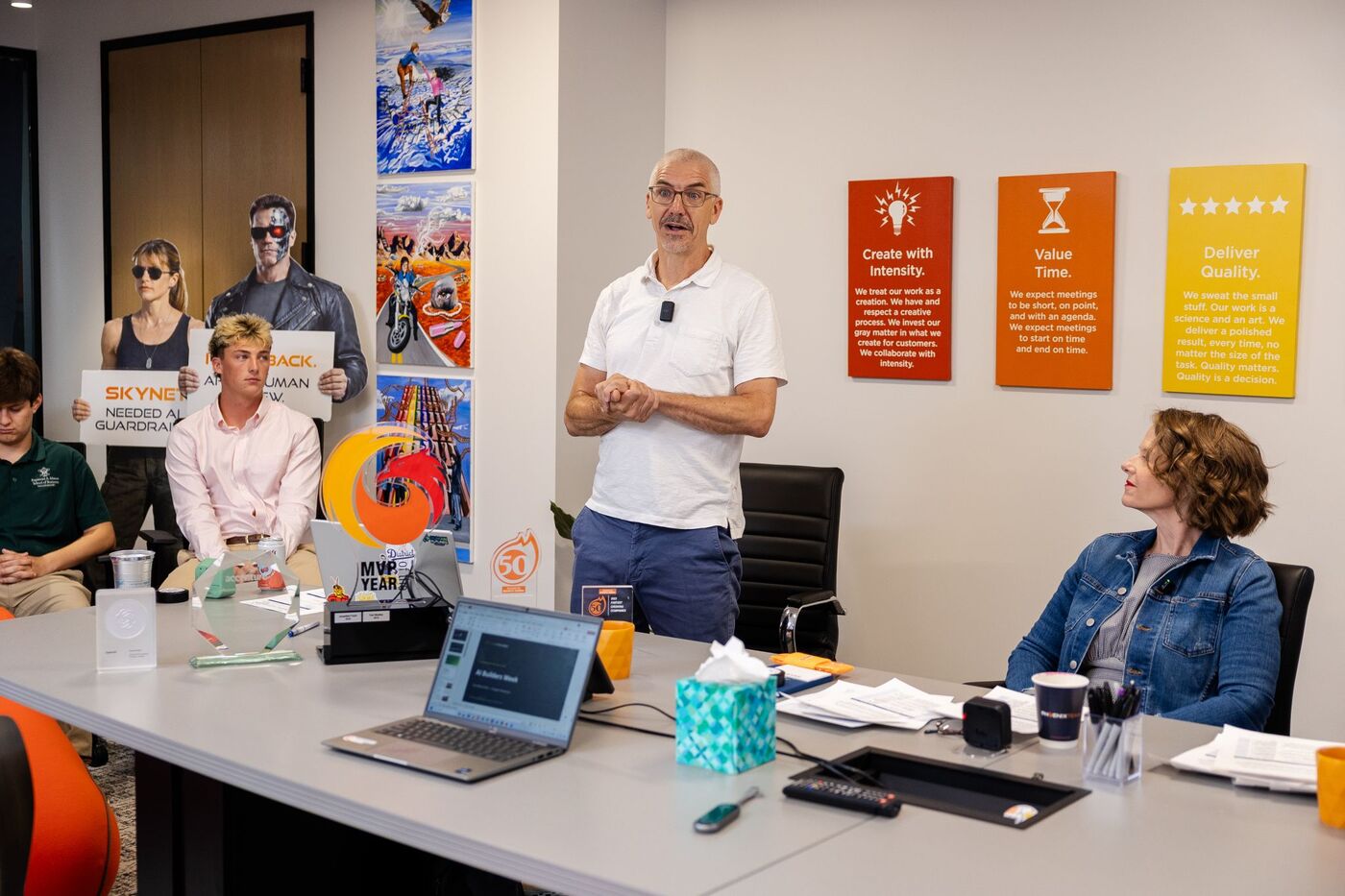 A PhoenixTeam practitioner asks a question during the Q&A after a demo