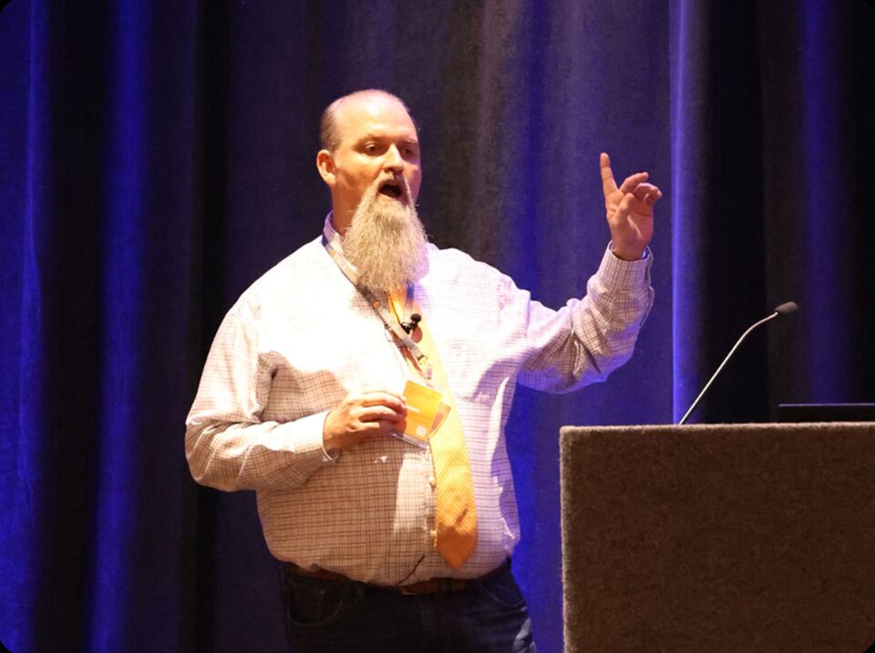 PhoenixTeam speaker presenting at an industry conference