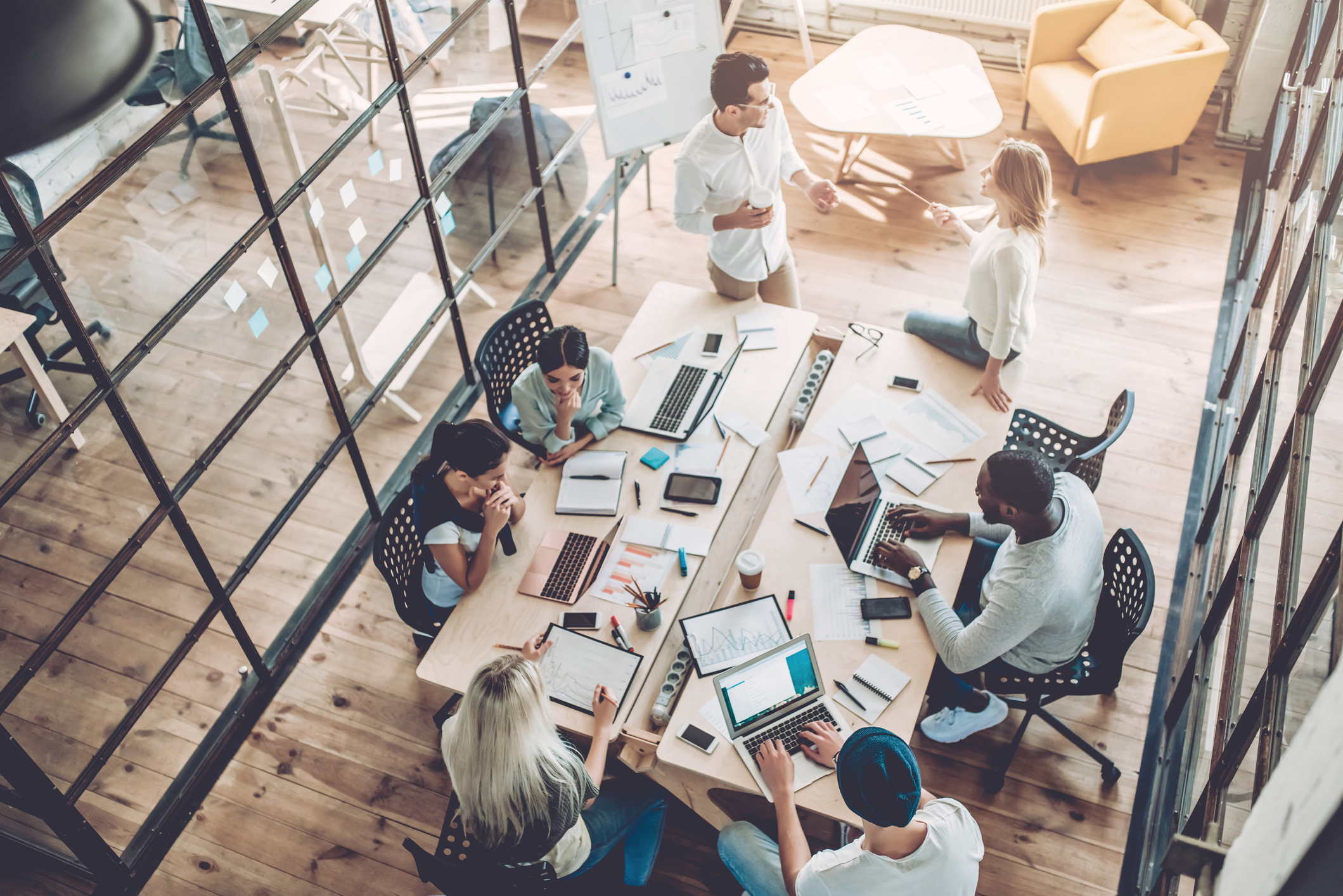 Young people work in modern office.